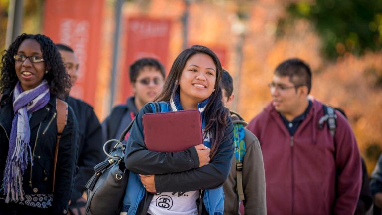 NJIT students happily walking the campus